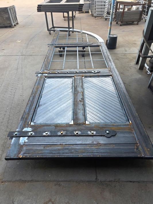 Custom Iron Decorative Door – Hand-Fabricated Arched Industrial Design | Lynndale Stainless